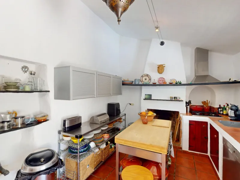 Nestled in the hills of Arenas, Málaga, this enchanting cortijo is more than just a home it's a Mediterranean haven full of character, peace, and possibility. Divided into three separate apartments, its perfectly suited for use as a charming B&B or a spac