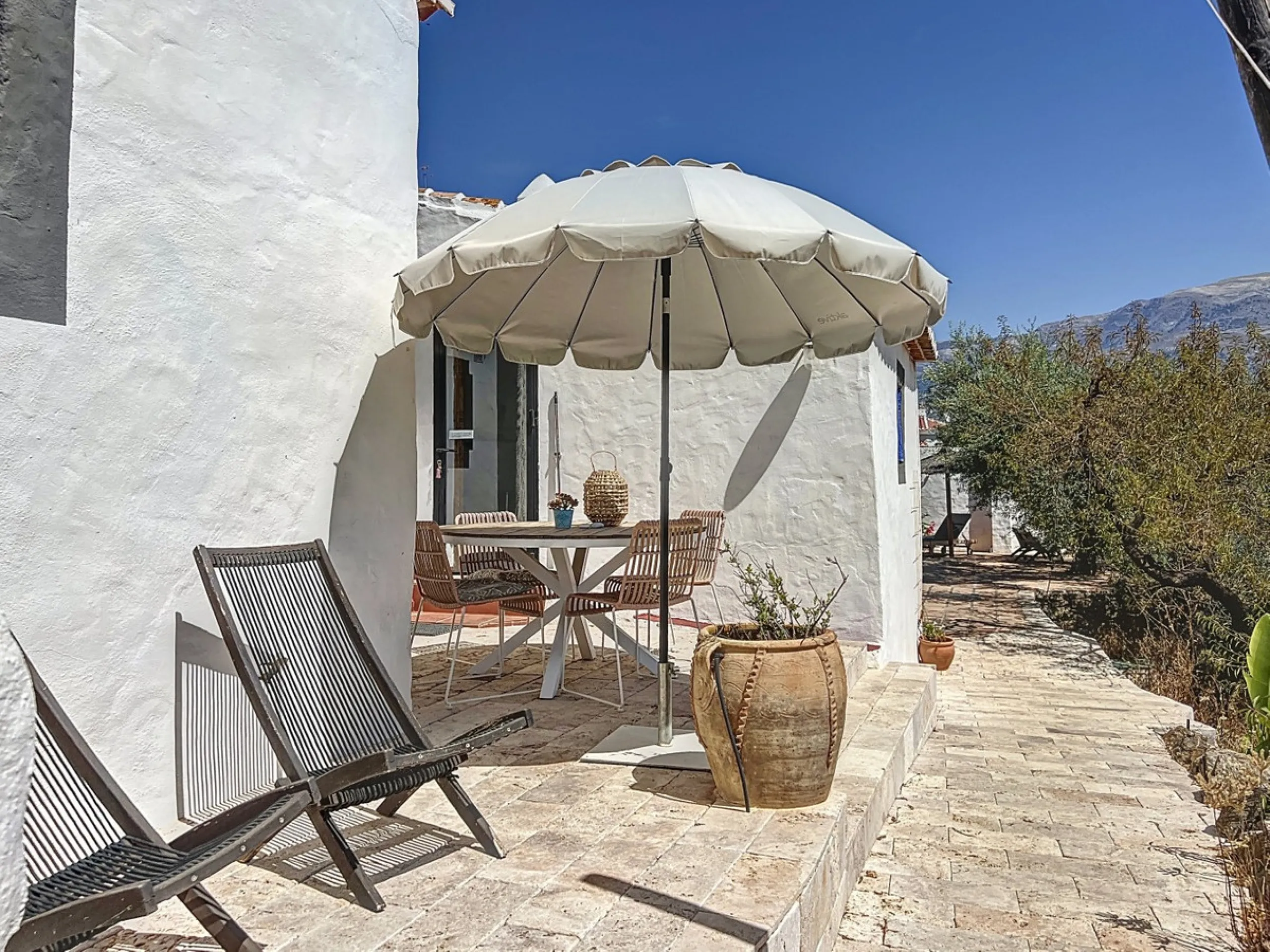 Nestled in the hills of Arenas, Málaga, this enchanting cortijo is more than just a home it's a Mediterranean haven full of character, peace, and possibility. Divided into three separate apartments, its perfectly suited for use as a charming B&B or a spac