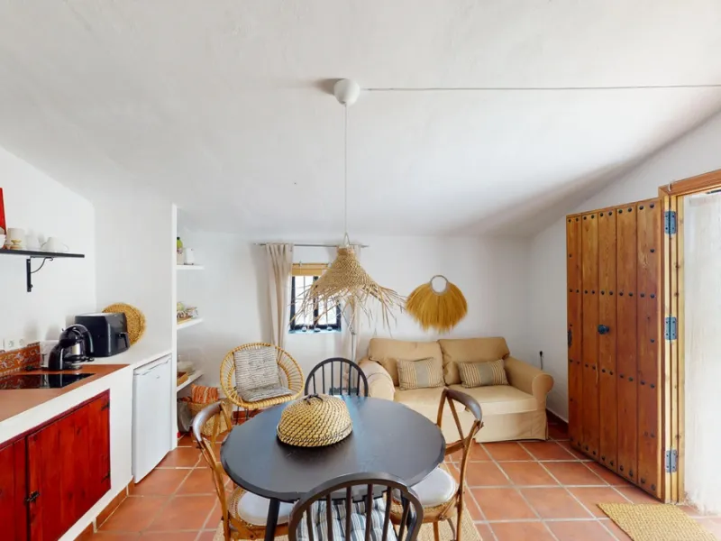 Nestled in the hills of Arenas, Málaga, this enchanting cortijo is more than just a home it's a Mediterranean haven full of character, peace, and possibility. Divided into three separate apartments, its perfectly suited for use as a charming B&B or a spac