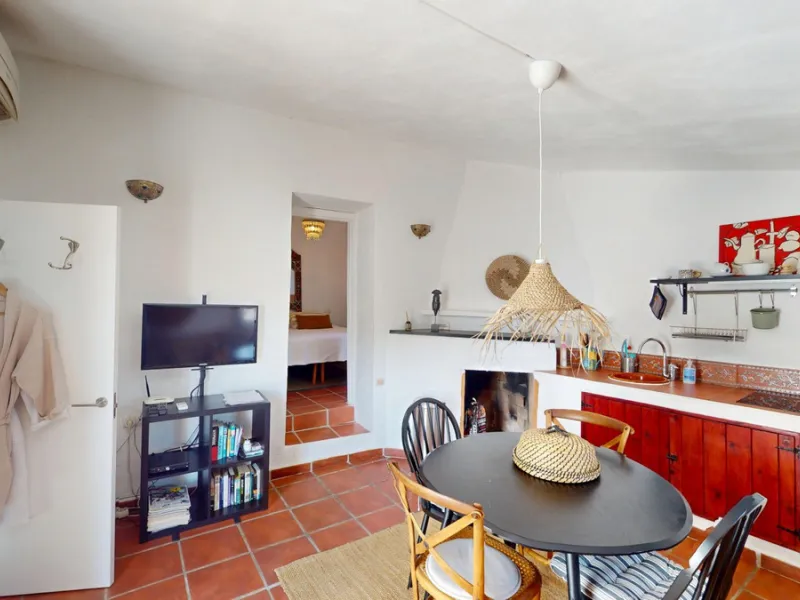 Nestled in the hills of Arenas, Málaga, this enchanting cortijo is more than just a home it's a Mediterranean haven full of character, peace, and possibility. Divided into three separate apartments, its perfectly suited for use as a charming B&B or a spac