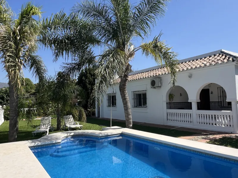 Tucked away in the peaceful El Velerín area of Estepona's prestigious New Golden Mile, this delightful detached villa offers the perfect blend of rustic charm, comfort and outdoor living.