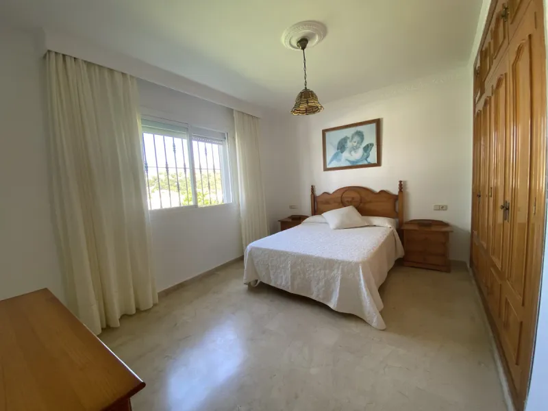 Tucked away in the peaceful El Velerín area of Estepona's prestigious New Golden Mile, this delightful detached villa offers the perfect blend of rustic charm, comfort and outdoor living.