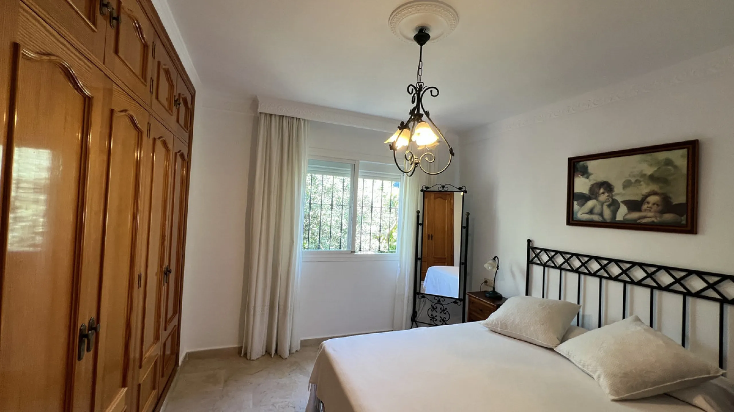 Tucked away in the peaceful El Velerín area of Estepona's prestigious New Golden Mile, this delightful detached villa offers the perfect blend of rustic charm, comfort and outdoor living.