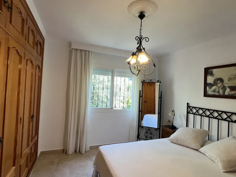Tucked away in the peaceful El Velerín area of Estepona's prestigious New Golden Mile, this delightful detached villa offers the perfect blend of rustic charm, comfort and outdoor living.