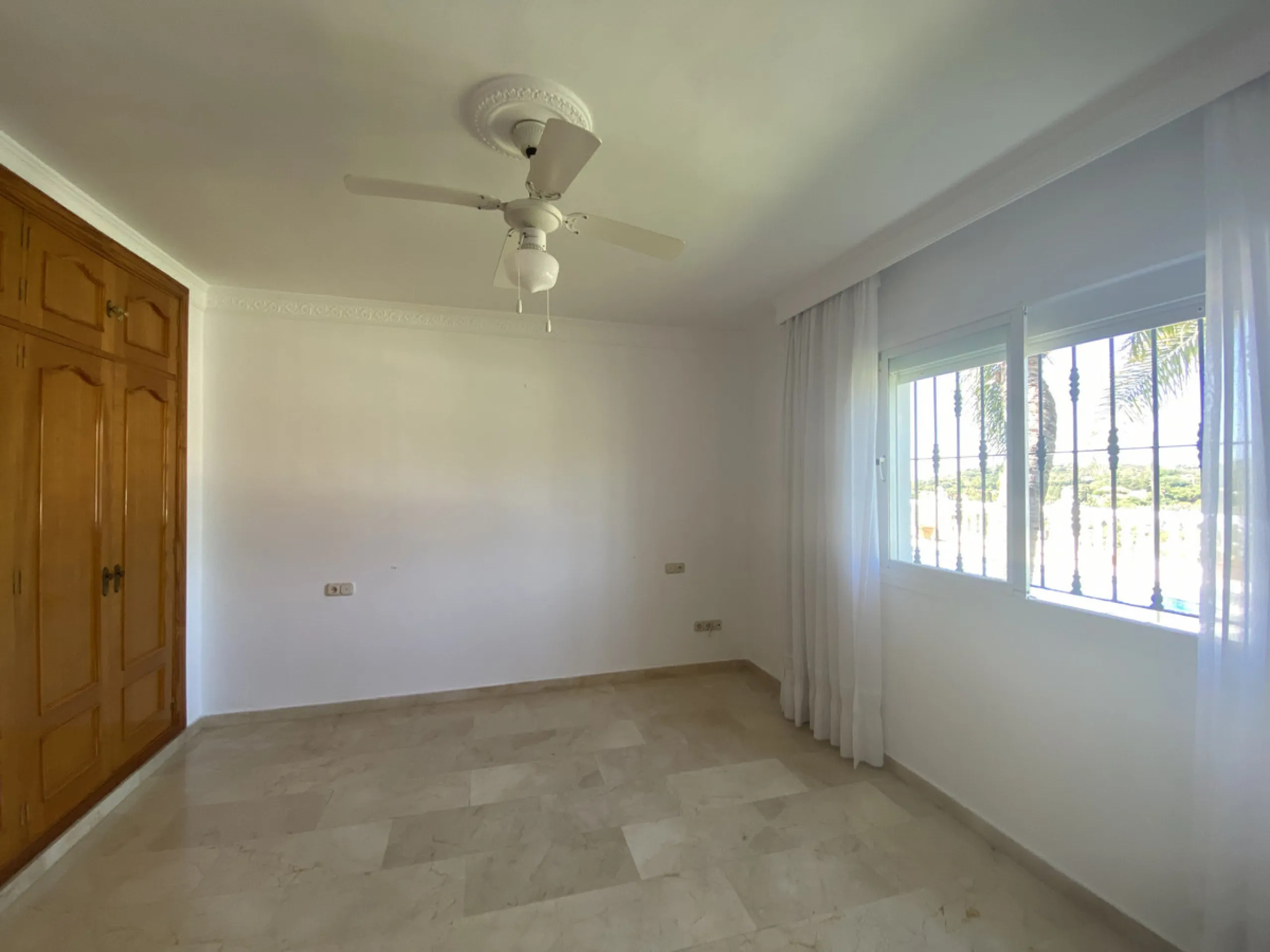 Tucked away in the peaceful El Velerín area of Estepona's prestigious New Golden Mile, this delightful detached villa offers the perfect blend of rustic charm, comfort and outdoor living.