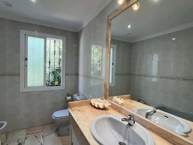 Tucked away in the peaceful El Velerín area of Estepona's prestigious New Golden Mile, this delightful detached villa offers the perfect blend of rustic charm, comfort and outdoor living.