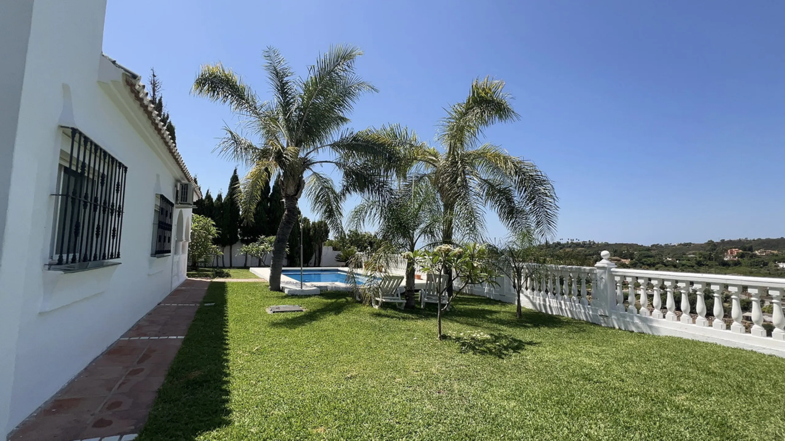 Tucked away in the peaceful El Velerín area of Estepona's prestigious New Golden Mile, this delightful detached villa offers the perfect blend of rustic charm, comfort and outdoor living.
