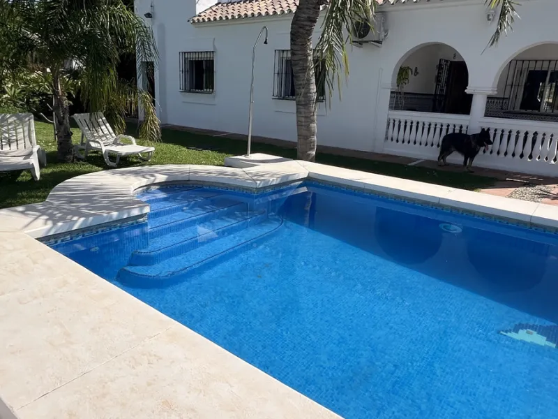 Tucked away in the peaceful El Velerín area of Estepona's prestigious New Golden Mile, this delightful detached villa offers the perfect blend of rustic charm, comfort and outdoor living.