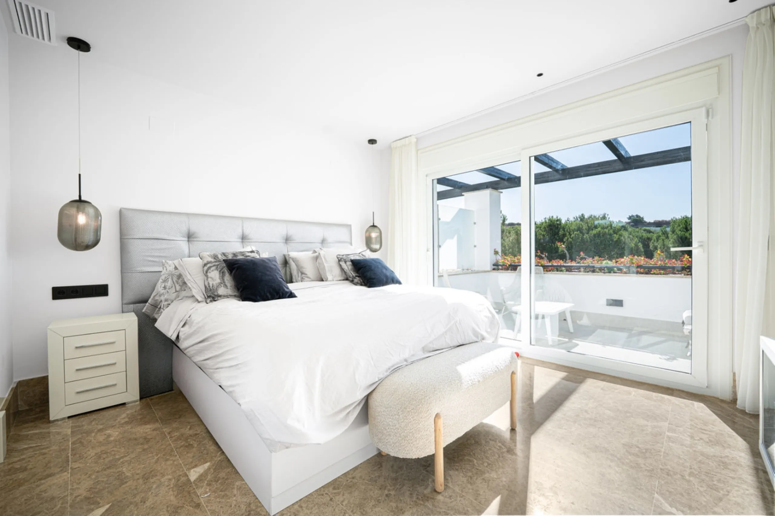 Experience effortless coastal living in Townhouse Targa, a modern Mediterranean home in the heart of Marbella East. This elegant townhouse sits in a secure gated community close to golden beaches and leading golf courses. Designed across three levels, it 