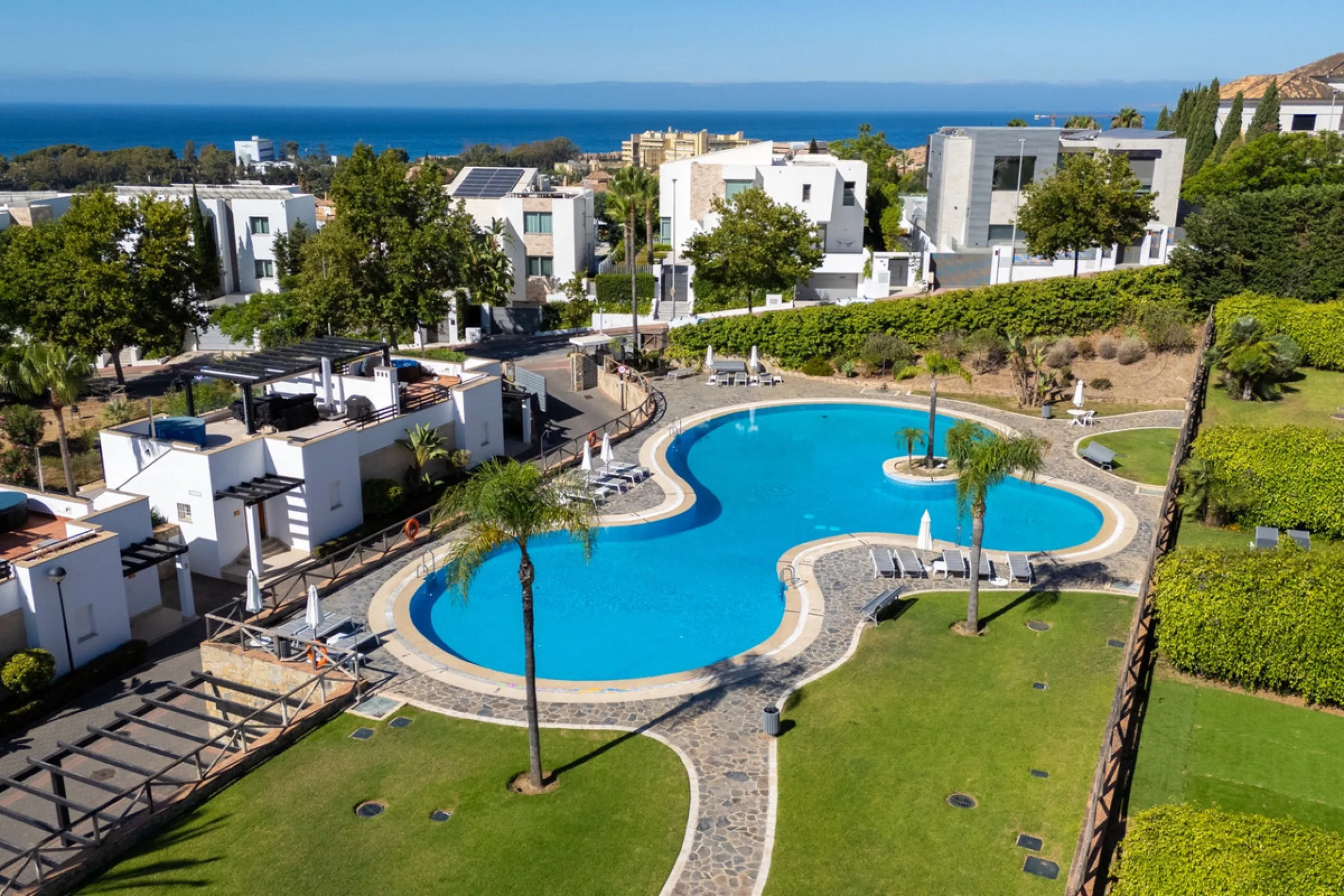 Experience effortless coastal living in Townhouse Targa, a modern Mediterranean home in the heart of Marbella East. This elegant townhouse sits in a secure gated community close to golden beaches and leading golf courses. Designed across three levels, it 