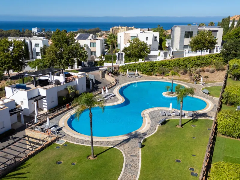 Experience effortless coastal living in Townhouse Targa, a modern Mediterranean home in the heart of Marbella East. This elegant townhouse sits in a secure gated community close to golden beaches and leading golf courses. Designed across three levels, it 