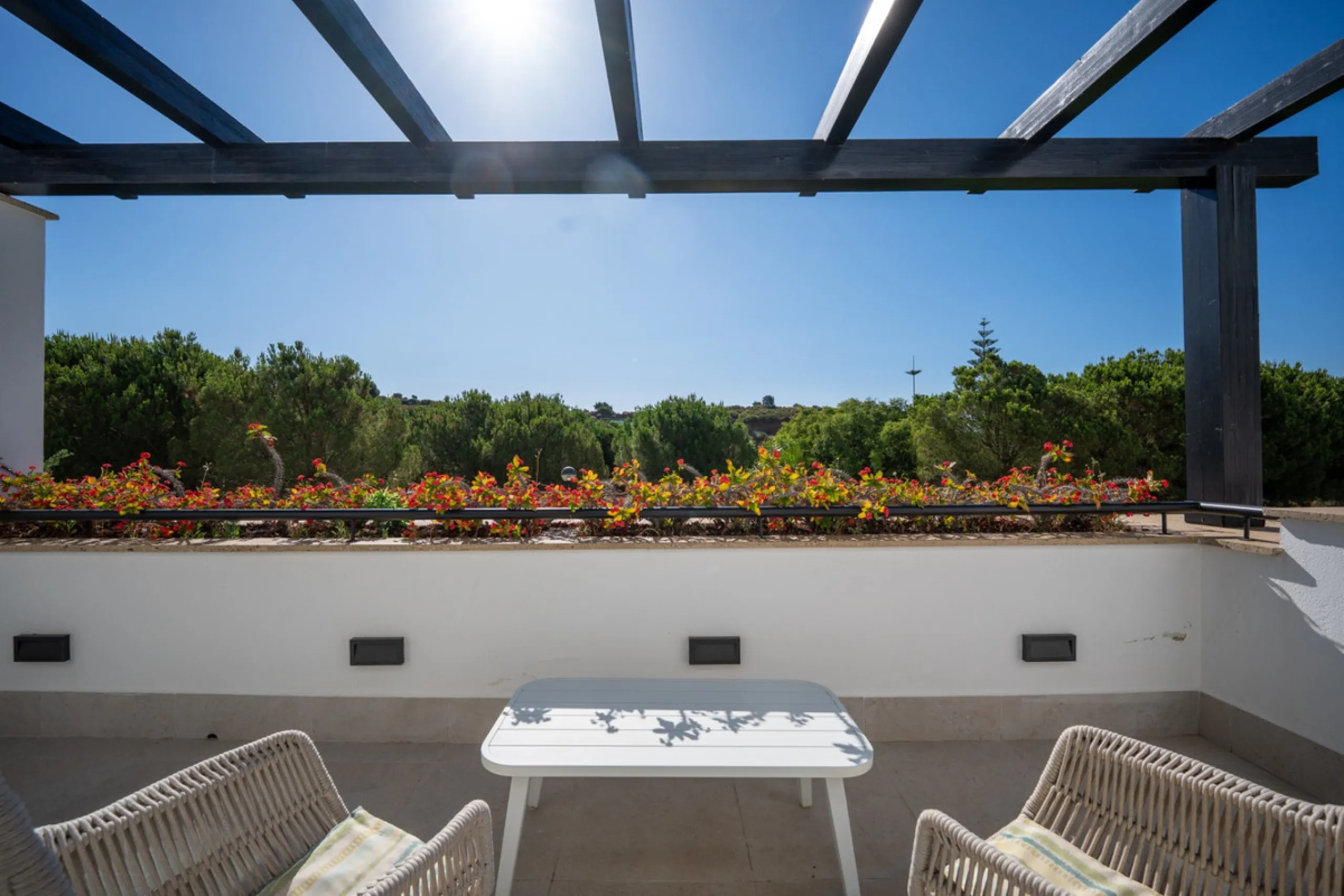 Experience effortless coastal living in Townhouse Targa, a modern Mediterranean home in the heart of Marbella East. This elegant townhouse sits in a secure gated community close to golden beaches and leading golf courses. Designed across three levels, it 