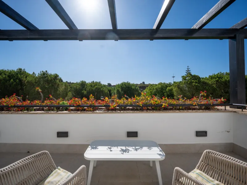 Experience effortless coastal living in Townhouse Targa, a modern Mediterranean home in the heart of Marbella East. This elegant townhouse sits in a secure gated community close to golden beaches and leading golf courses. Designed across three levels, it 