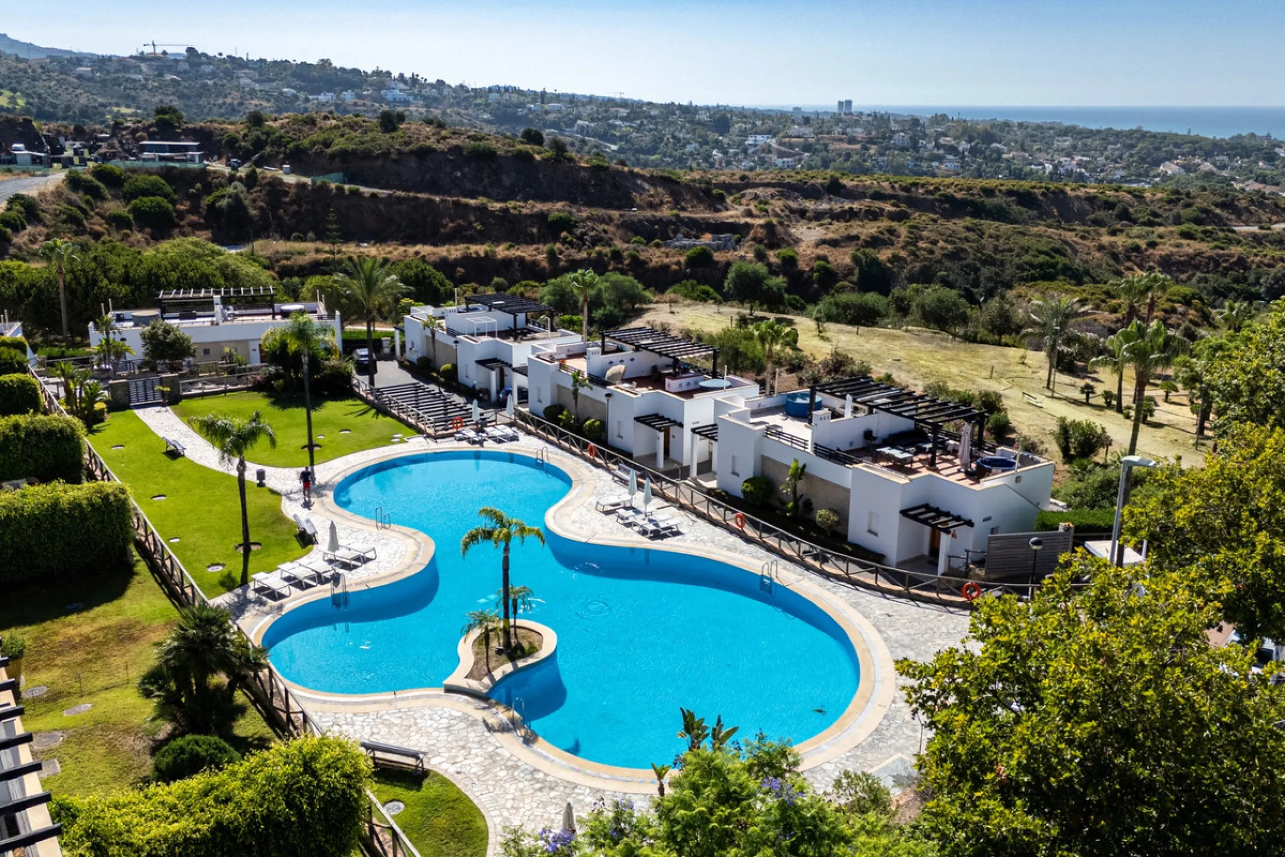 Experience effortless coastal living in Townhouse Targa, a modern Mediterranean home in the heart of Marbella East. This elegant townhouse sits in a secure gated community close to golden beaches and leading golf courses. Designed across three levels, it 