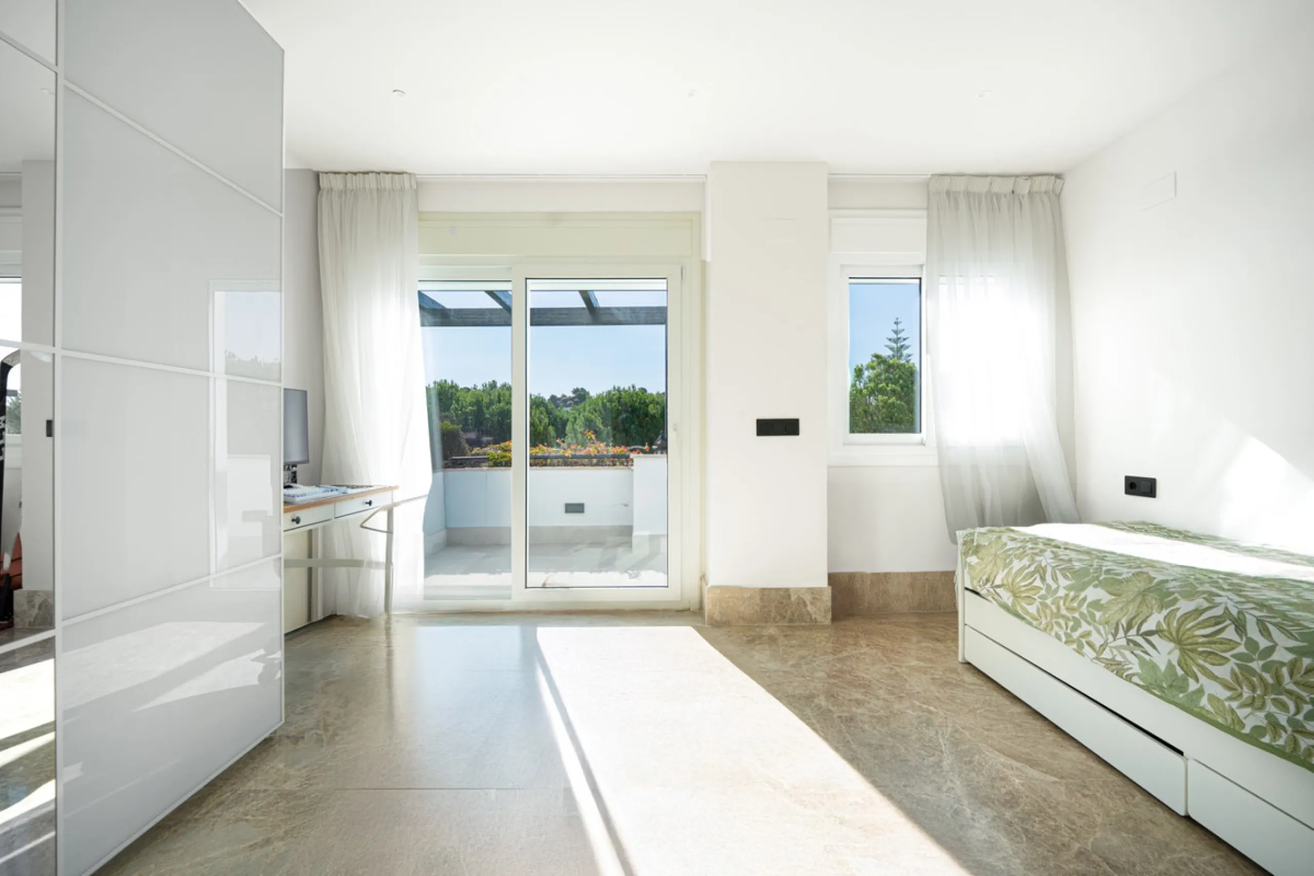 Experience effortless coastal living in Townhouse Targa, a modern Mediterranean home in the heart of Marbella East. This elegant townhouse sits in a secure gated community close to golden beaches and leading golf courses. Designed across three levels, it 