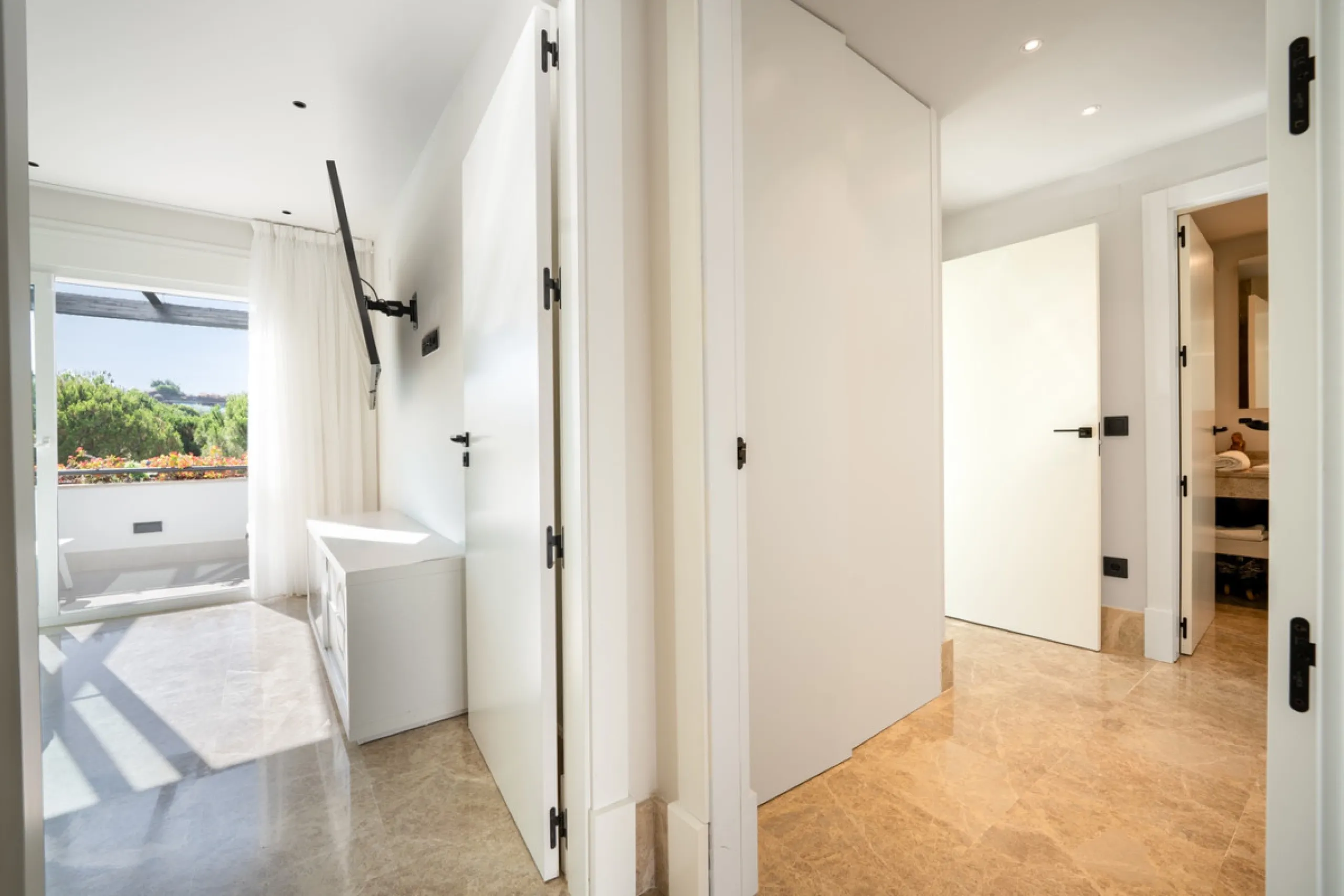 Experience effortless coastal living in Townhouse Targa, a modern Mediterranean home in the heart of Marbella East. This elegant townhouse sits in a secure gated community close to golden beaches and leading golf courses. Designed across three levels, it 