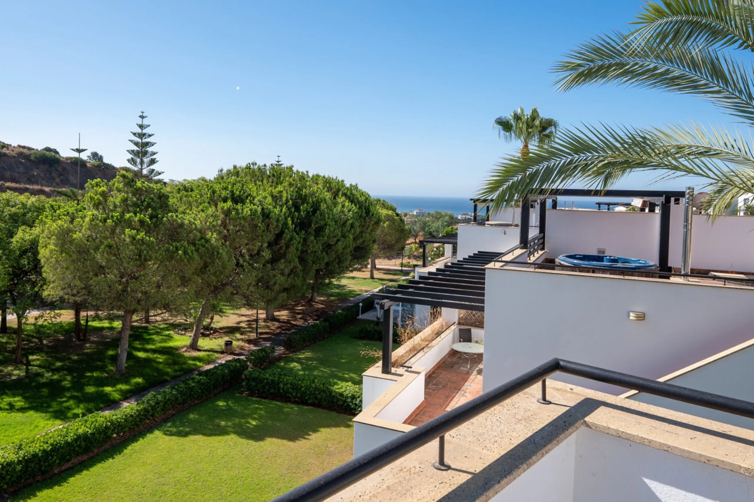 Experience effortless coastal living in Townhouse Targa, a modern Mediterranean home in the heart of Marbella East. This elegant townhouse sits in a secure gated community close to golden beaches and leading golf courses. Designed across three levels, it 