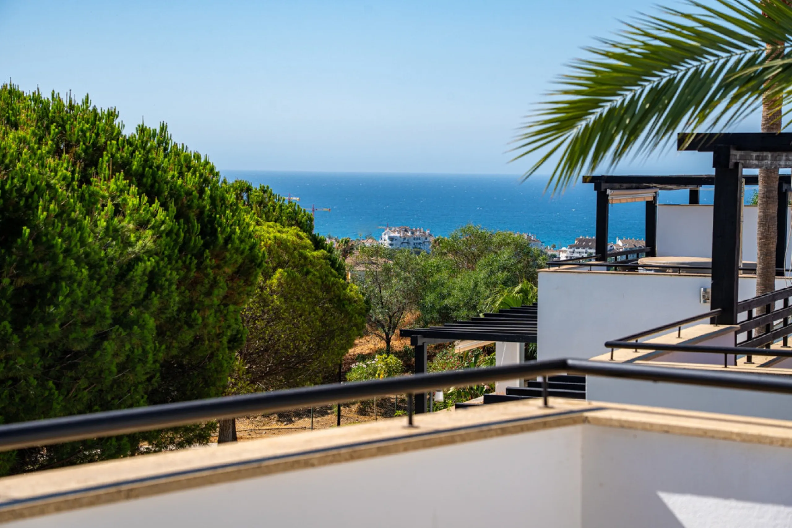 Experience effortless coastal living in Townhouse Targa, a modern Mediterranean home in the heart of Marbella East. This elegant townhouse sits in a secure gated community close to golden beaches and leading golf courses. Designed across three levels, it 
