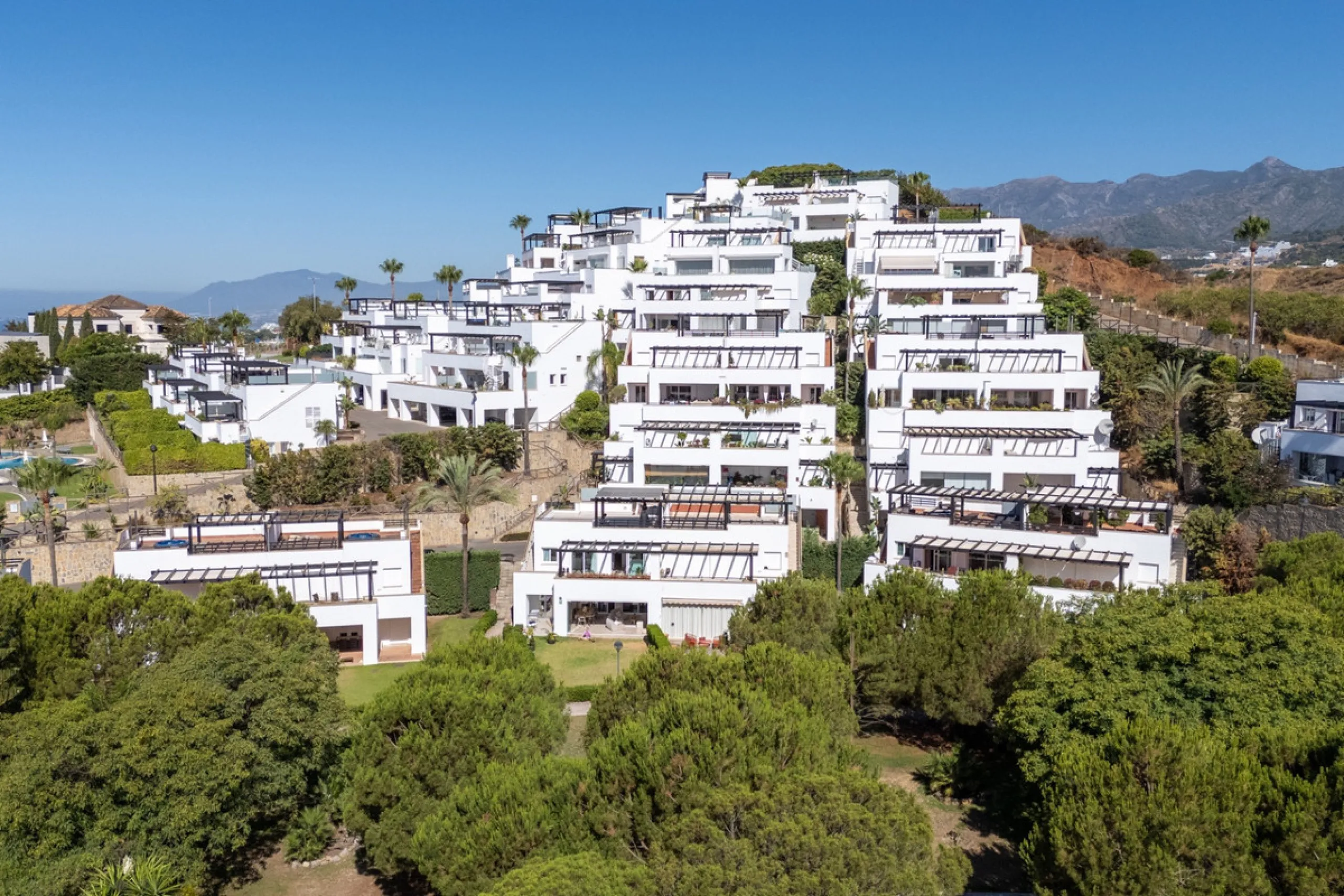 Experience effortless coastal living in Townhouse Targa, a modern Mediterranean home in the heart of Marbella East. This elegant townhouse sits in a secure gated community close to golden beaches and leading golf courses. Designed across three levels, it 