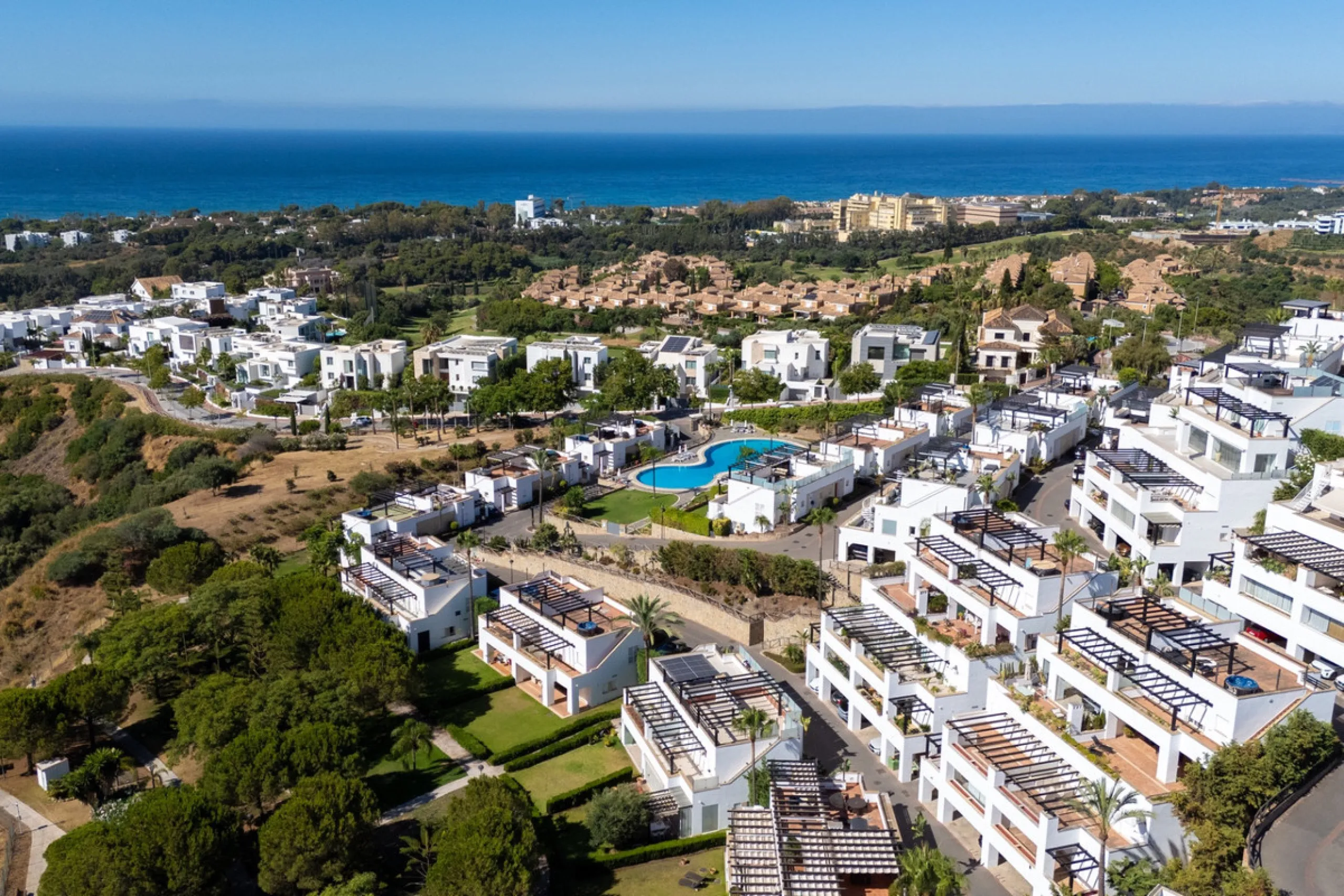 Experience effortless coastal living in Townhouse Targa, a modern Mediterranean home in the heart of Marbella East. This elegant townhouse sits in a secure gated community close to golden beaches and leading golf courses. Designed across three levels, it 
