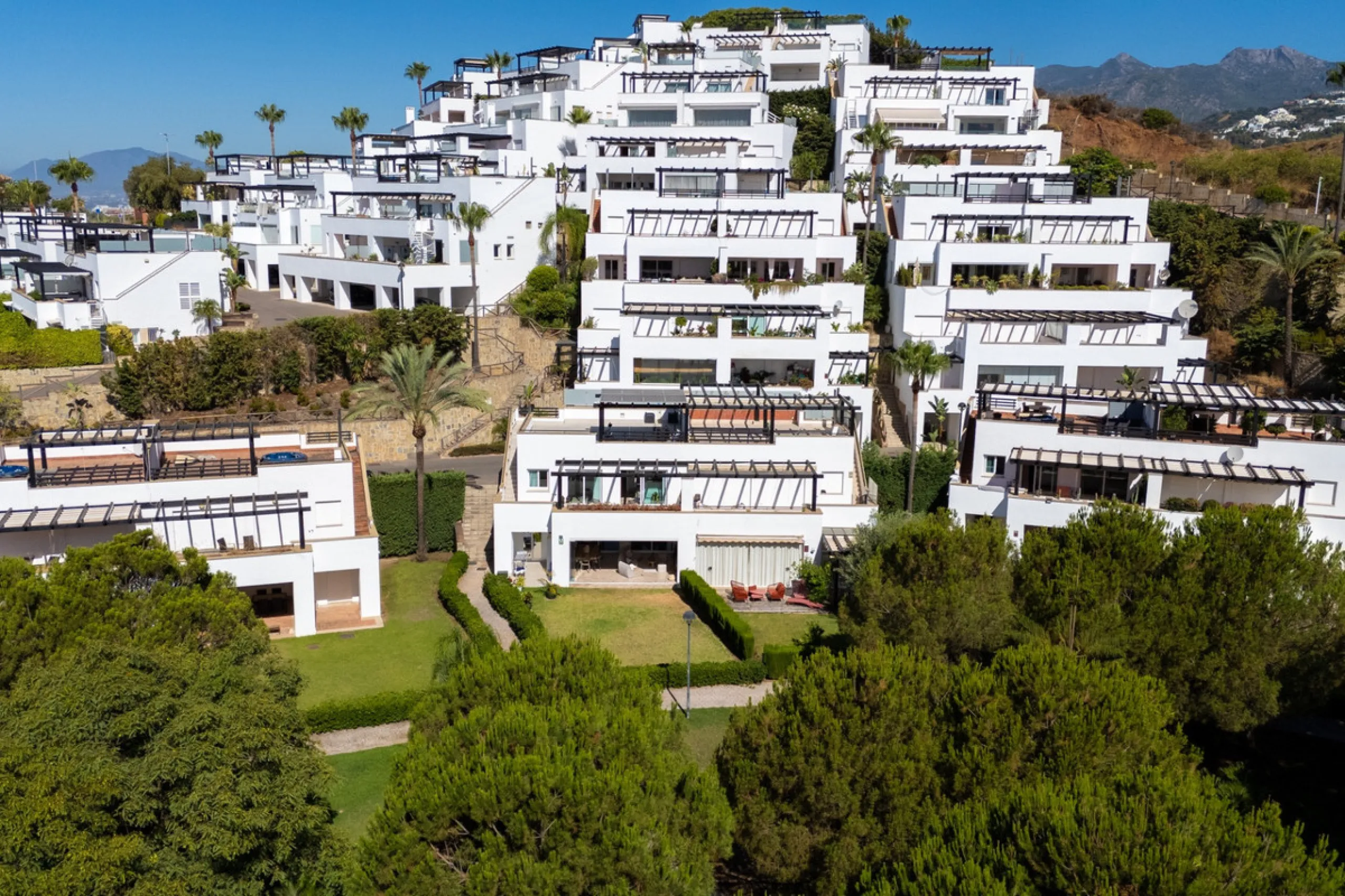 Experience effortless coastal living in Townhouse Targa, a modern Mediterranean home in the heart of Marbella East. This elegant townhouse sits in a secure gated community close to golden beaches and leading golf courses. Designed across three levels, it 