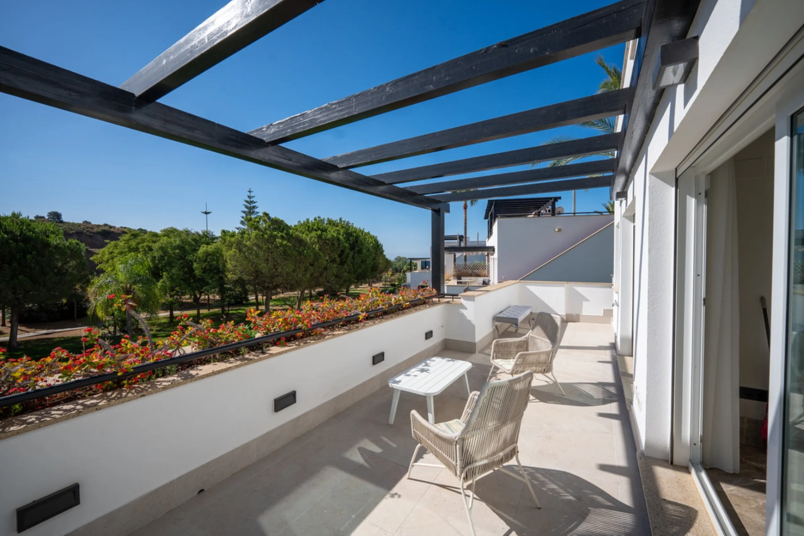 Experience effortless coastal living in Townhouse Targa, a modern Mediterranean home in the heart of Marbella East. This elegant townhouse sits in a secure gated community close to golden beaches and leading golf courses. Designed across three levels, it 