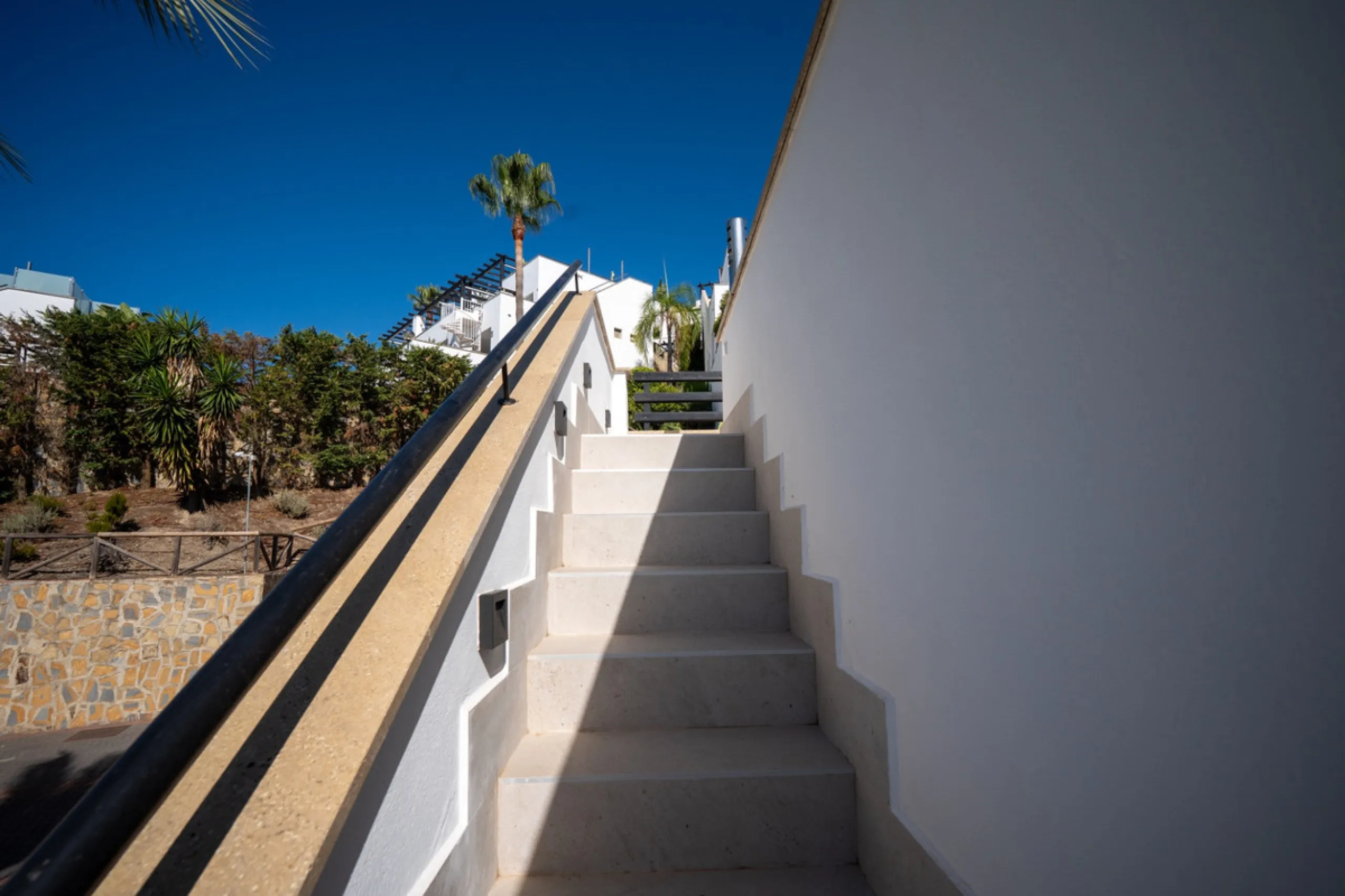 Experience effortless coastal living in Townhouse Targa, a modern Mediterranean home in the heart of Marbella East. This elegant townhouse sits in a secure gated community close to golden beaches and leading golf courses. Designed across three levels, it 