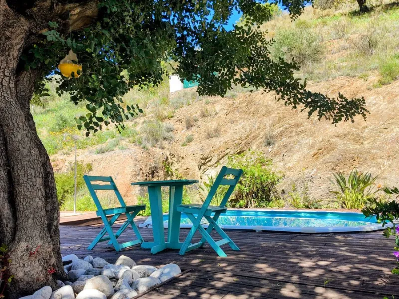 This charming property features a spacious 3-bedroom, 1-bathroom house with two levels, located in the peaceful Barranco del Sol neighborhood. only 25 min drive to Malaga