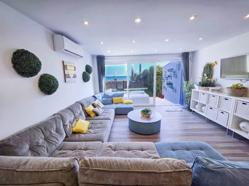 Absolutely beachfront, with uninterrupted panoramic sea views, this completely renovated apartment in Casares Costa sits directly on the beach promenade, offering the perfect blend of modern comfort and unbeatable coastal lifestyle. Stylishly refurbished 