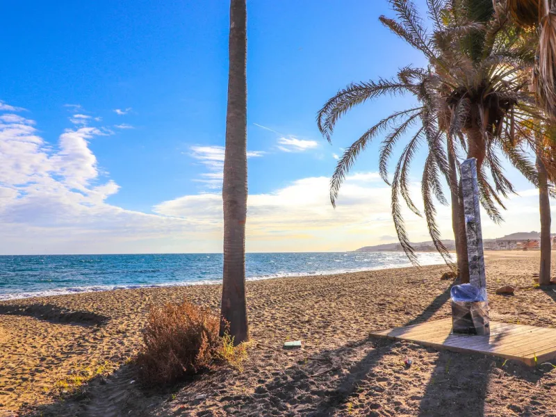 Absolutely beachfront, with uninterrupted panoramic sea views, this completely renovated apartment in Casares Costa sits directly on the beach promenade, offering the perfect blend of modern comfort and unbeatable coastal lifestyle. Stylishly refurbished 