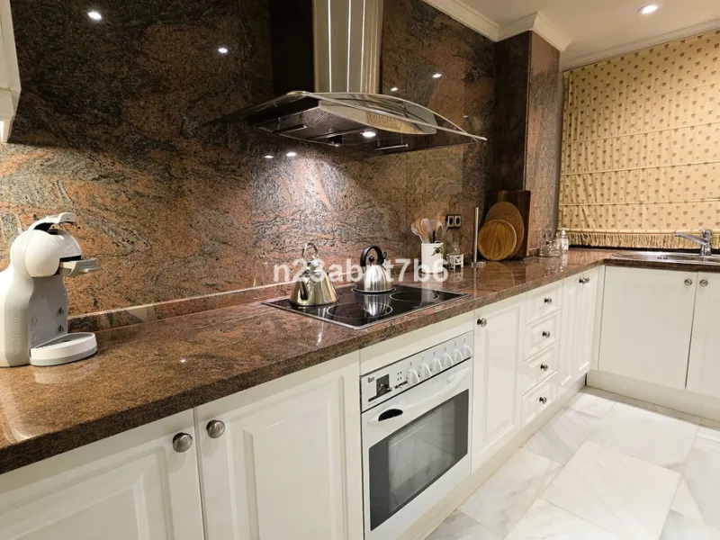 Welcome to this beautifully presented 2-bedroom, 2-bathroom apartment for sale in Magna Marbella, one of the most sought-after residential developments in the heart of Nueva Andalucía's Golf Valley, Marbella.