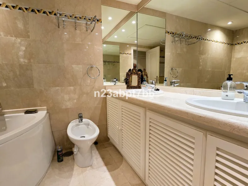 Welcome to this beautifully presented 2-bedroom, 2-bathroom apartment for sale in Magna Marbella, one of the most sought-after residential developments in the heart of Nueva Andalucía's Golf Valley, Marbella.