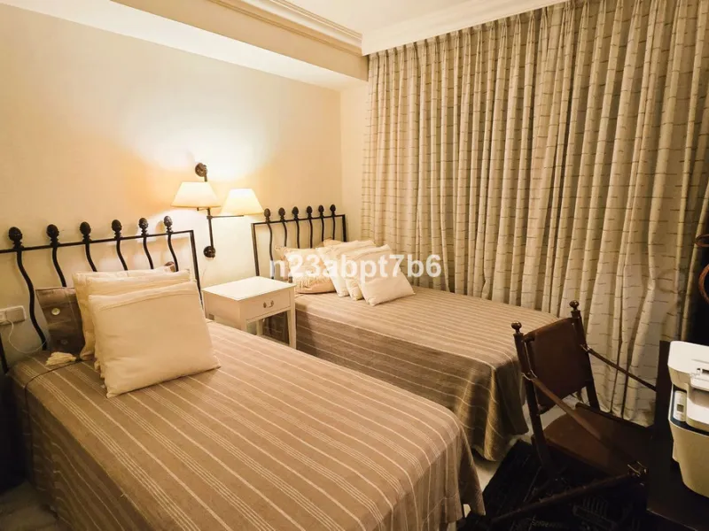 Welcome to this beautifully presented 2-bedroom, 2-bathroom apartment for sale in Magna Marbella, one of the most sought-after residential developments in the heart of Nueva Andalucía's Golf Valley, Marbella.