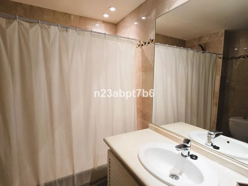 Welcome to this beautifully presented 2-bedroom, 2-bathroom apartment for sale in Magna Marbella, one of the most sought-after residential developments in the heart of Nueva Andalucía's Golf Valley, Marbella.