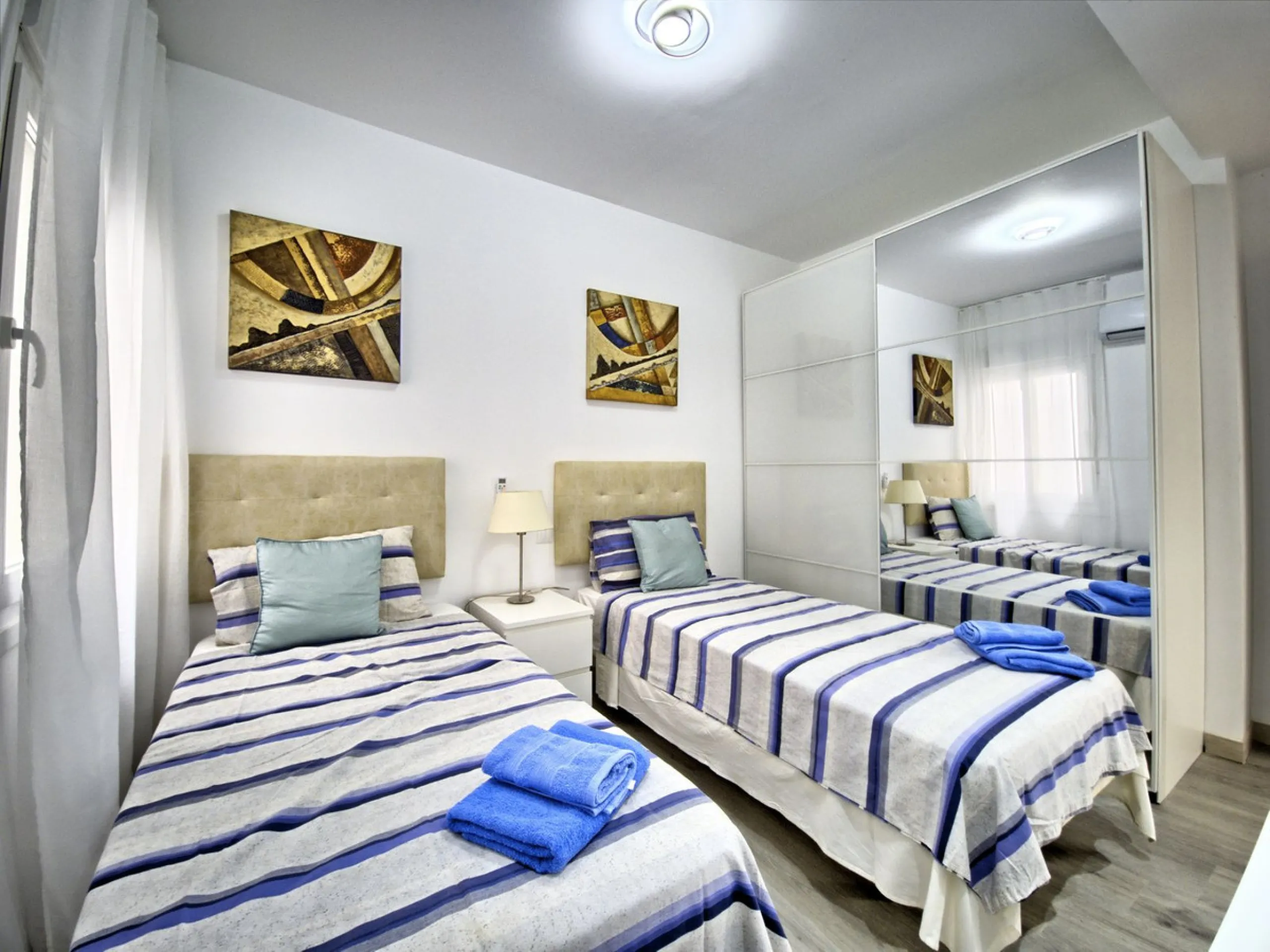 This beautifully renovated and fully furnished 2-bedroom apartment offers a rare blend of modern comfortand unbeatable location. The apartment features two spacious bedrooms with brand-new furnishings, a bright open-plan living area, a fully equipped smar