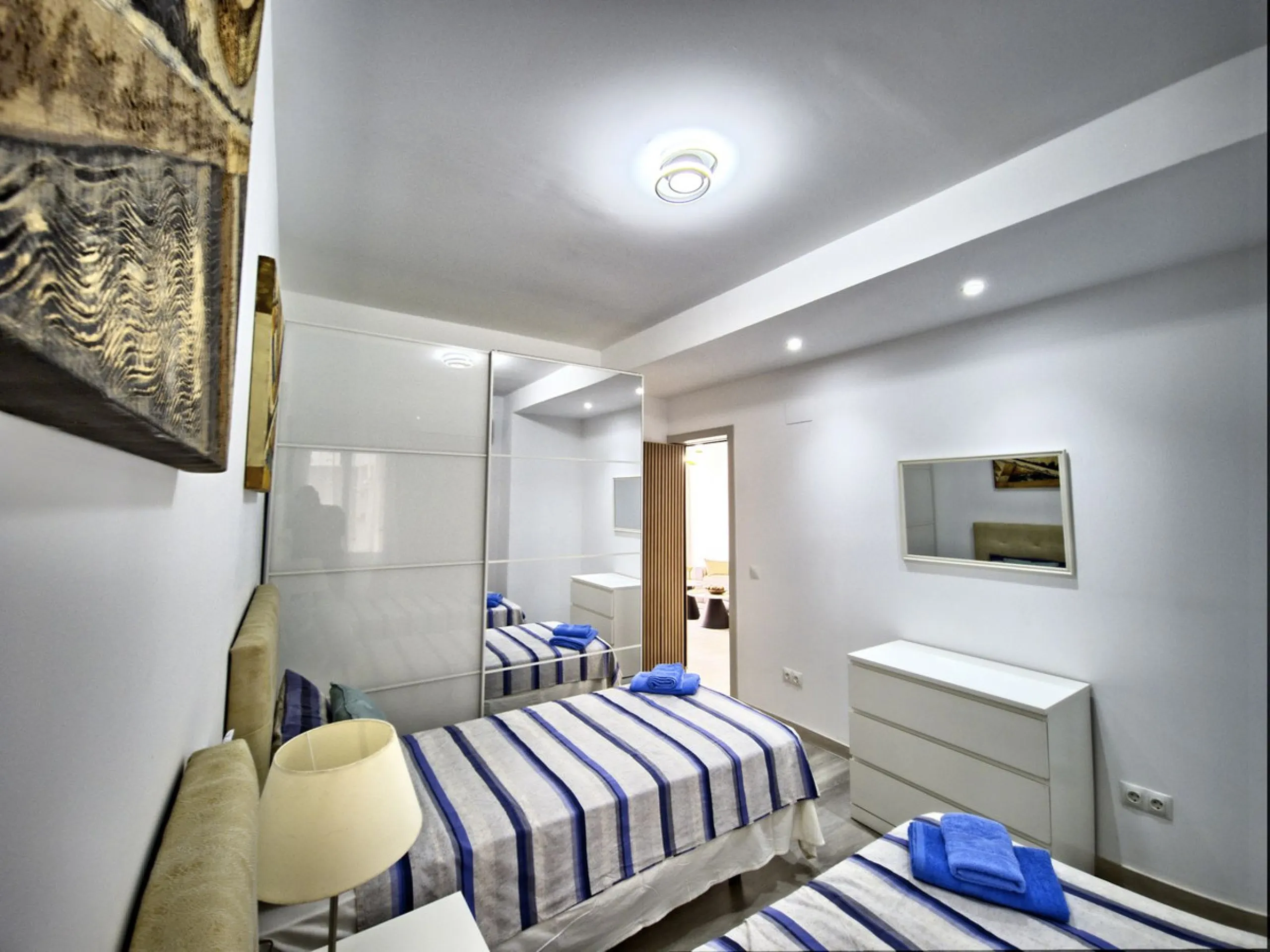 This beautifully renovated and fully furnished 2-bedroom apartment offers a rare blend of modern comfortand unbeatable location. The apartment features two spacious bedrooms with brand-new furnishings, a bright open-plan living area, a fully equipped smar