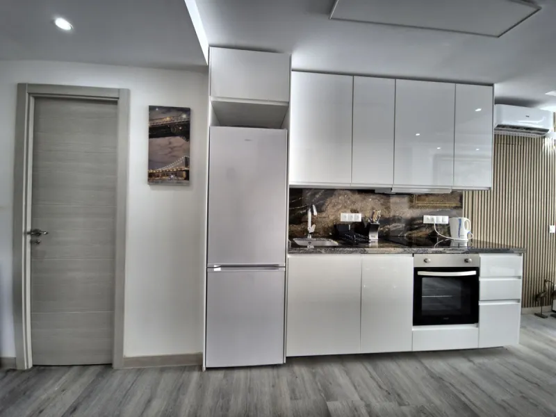 This beautifully renovated and fully furnished 2-bedroom apartment offers a rare blend of modern comfortand unbeatable location. The apartment features two spacious bedrooms with brand-new furnishings, a bright open-plan living area, a fully equipped smar