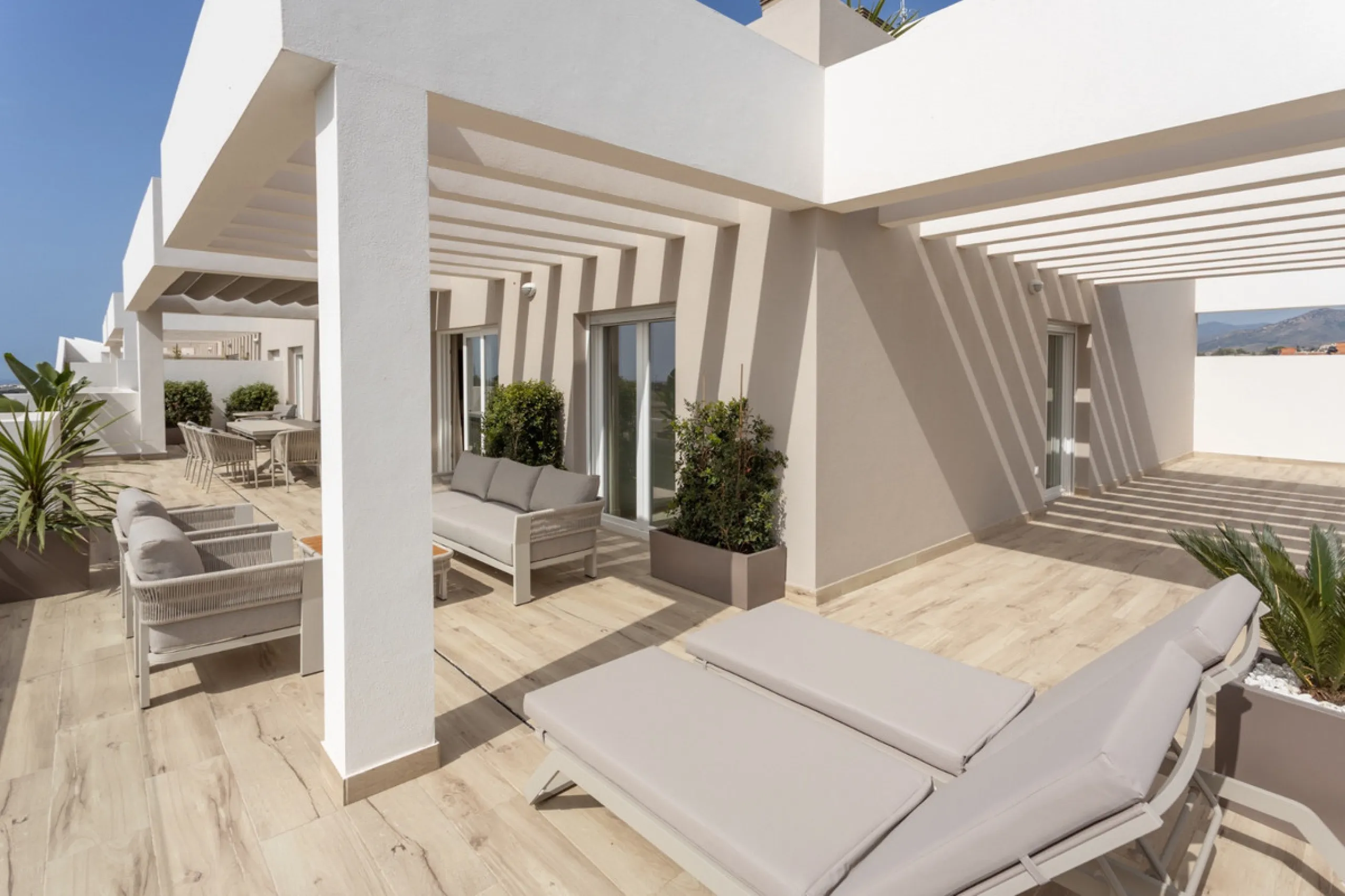 Discover modern coastal living in Apartment Albatros, a south-facing four-bedroom penthouse in the heart of La Campana. This bright and spacious home features two elegant bathrooms, an open-plan living and dining area, and a fully equipped kitchen with hi