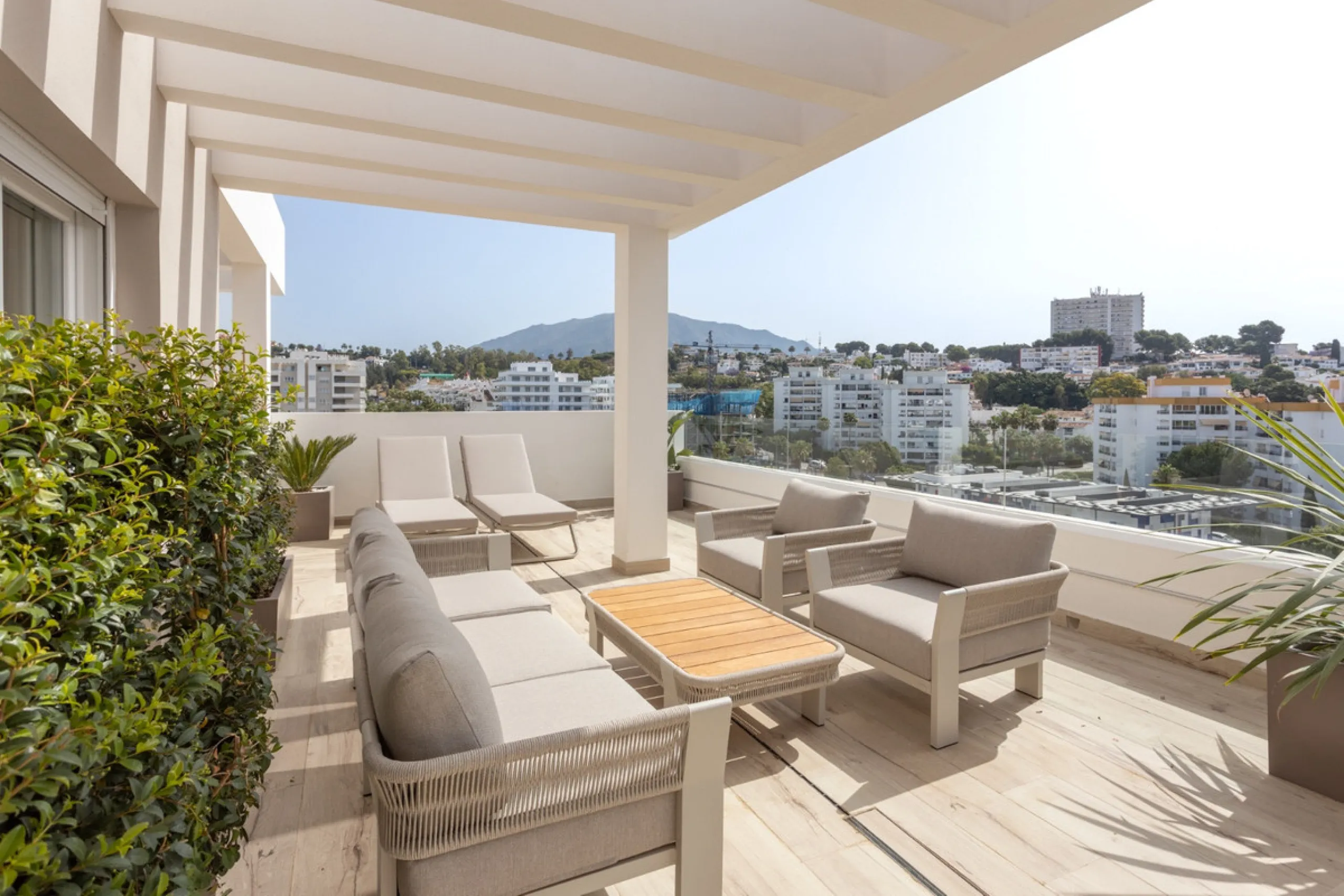 Discover modern coastal living in Apartment Albatros, a south-facing four-bedroom penthouse in the heart of La Campana. This bright and spacious home features two elegant bathrooms, an open-plan living and dining area, and a fully equipped kitchen with hi