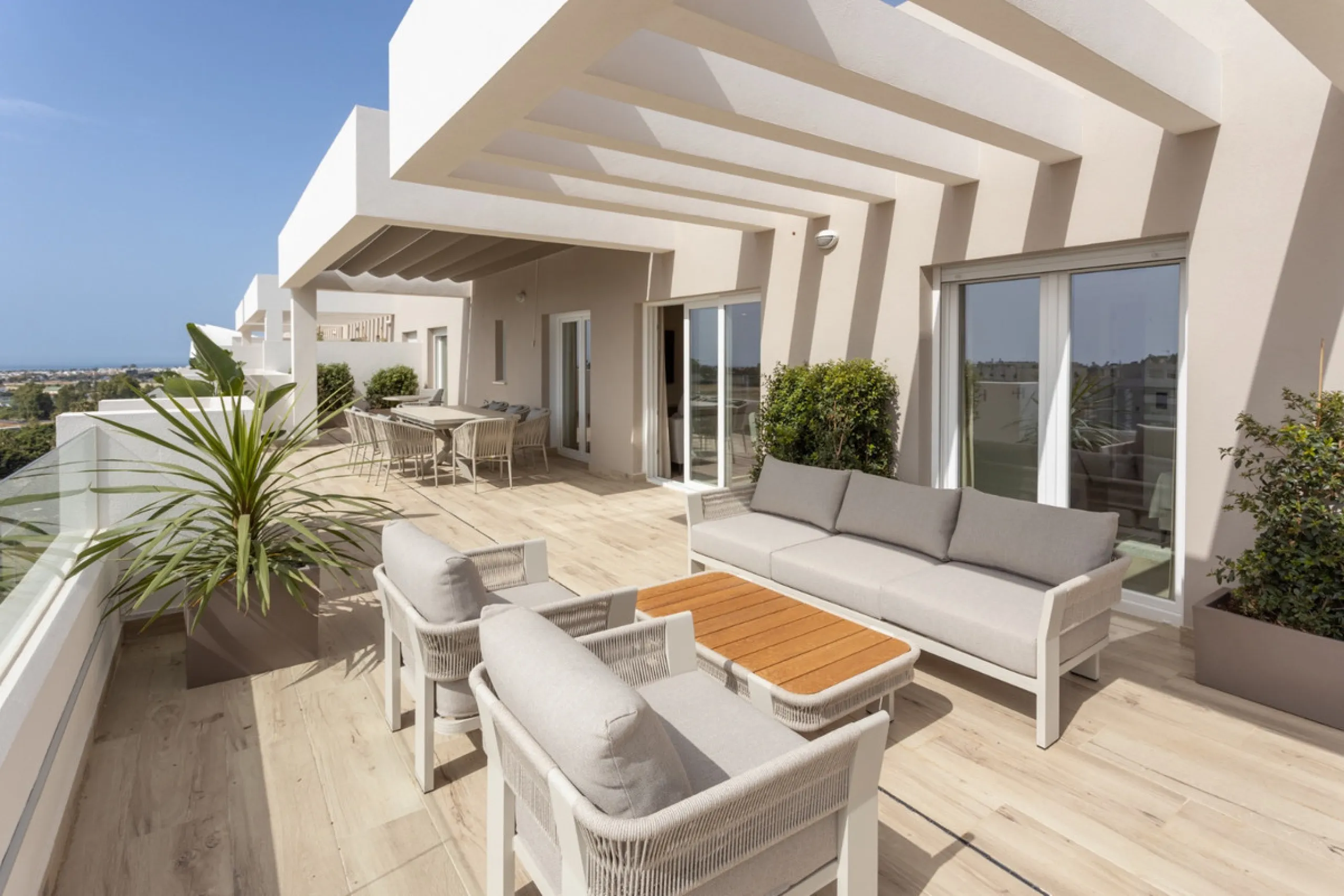 Discover modern coastal living in Apartment Albatros, a south-facing four-bedroom penthouse in the heart of La Campana. This bright and spacious home features two elegant bathrooms, an open-plan living and dining area, and a fully equipped kitchen with hi