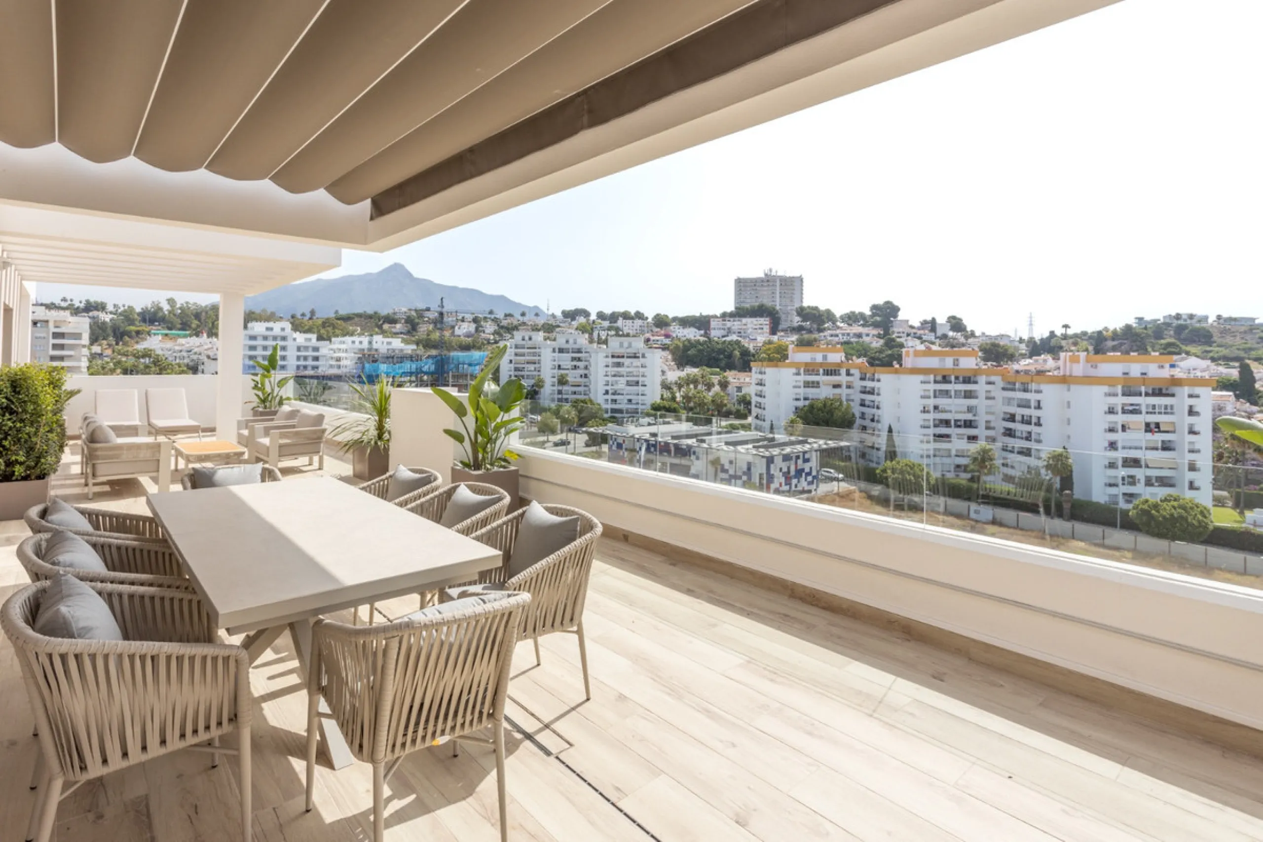 Discover modern coastal living in Apartment Albatros, a south-facing four-bedroom penthouse in the heart of La Campana. This bright and spacious home features two elegant bathrooms, an open-plan living and dining area, and a fully equipped kitchen with hi