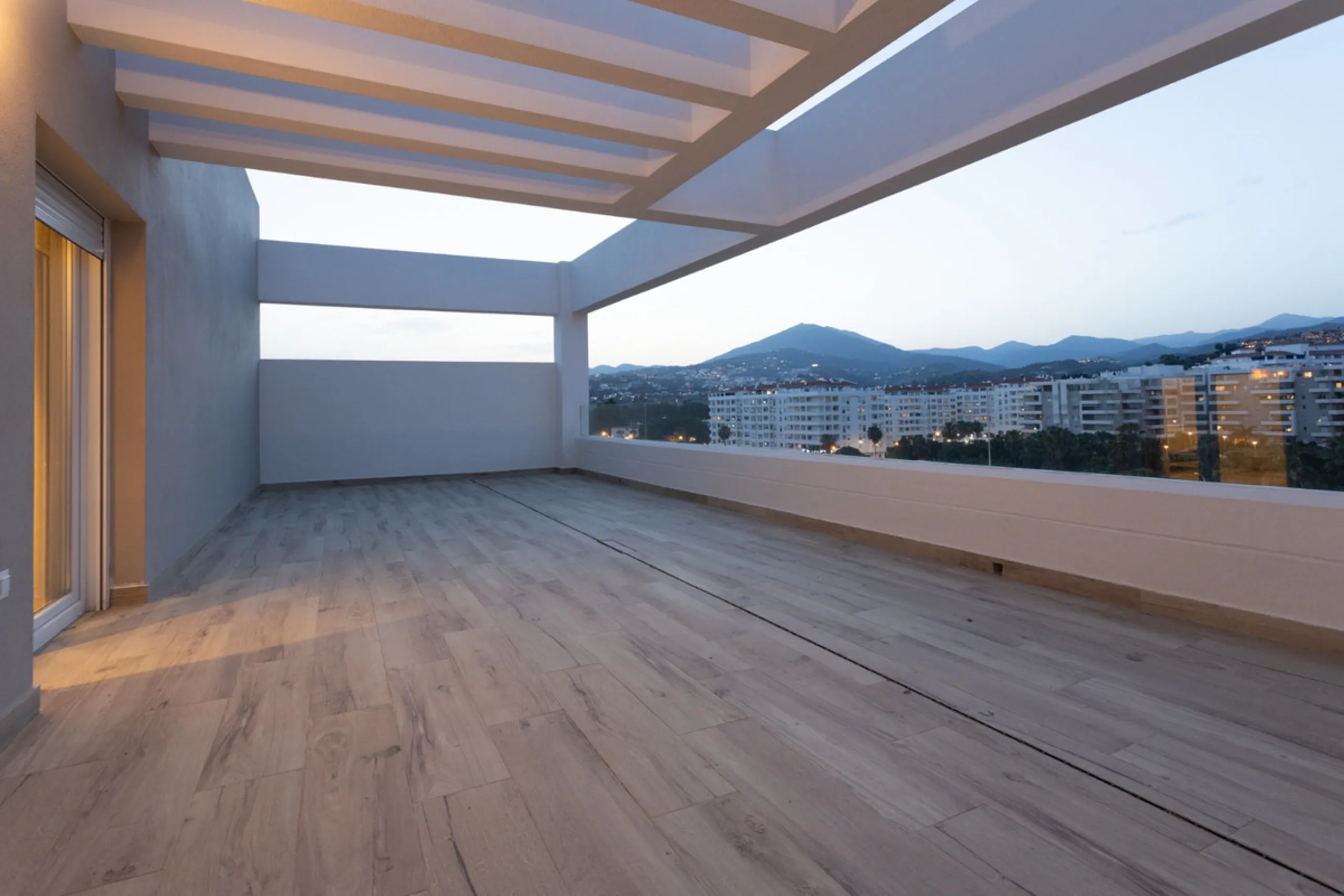 Discover modern coastal living in Apartment Albatros, a south-facing four-bedroom penthouse in the heart of La Campana. This bright and spacious home features two elegant bathrooms, an open-plan living and dining area, and a fully equipped kitchen with hi
