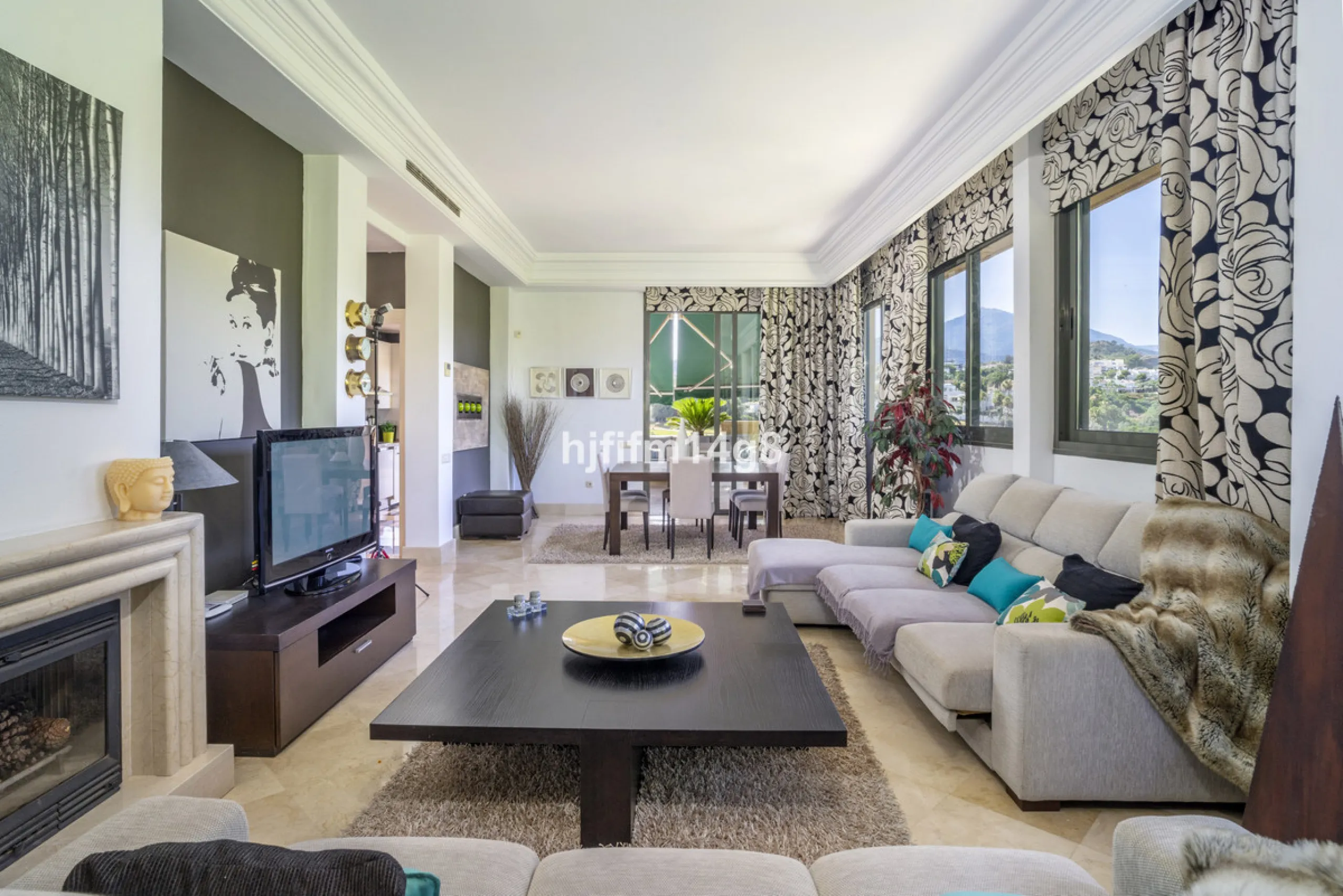 Welcome to this bright and spacious 2-bedroom penthouse in the sought-after Lorcrigolf community, perfectly positioned next to the golf course and offering spectacular views of La Concha Mountain.