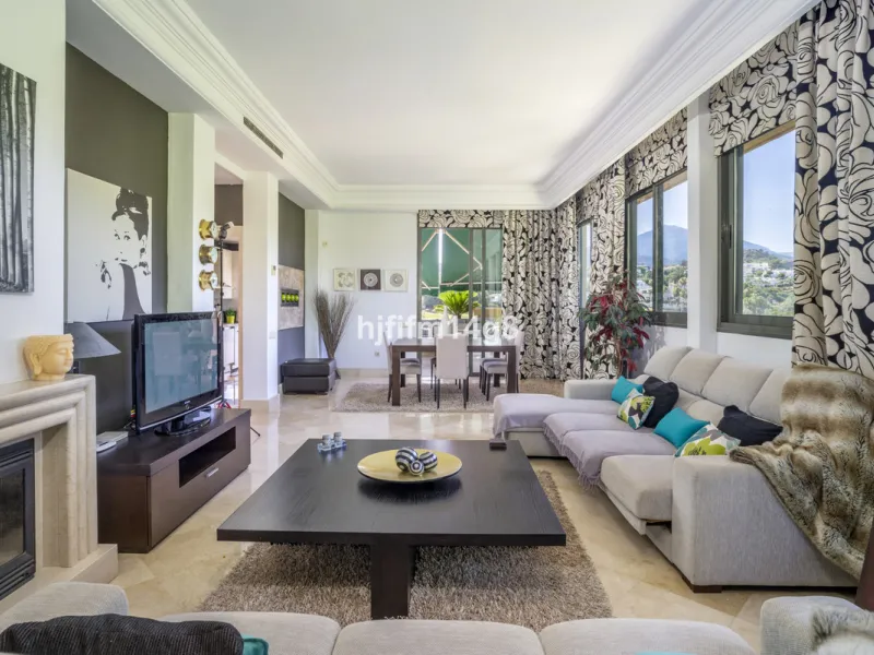 Welcome to this bright and spacious 2-bedroom penthouse in the sought-after Lorcrigolf community, perfectly positioned next to the golf course and offering spectacular views of La Concha Mountain.