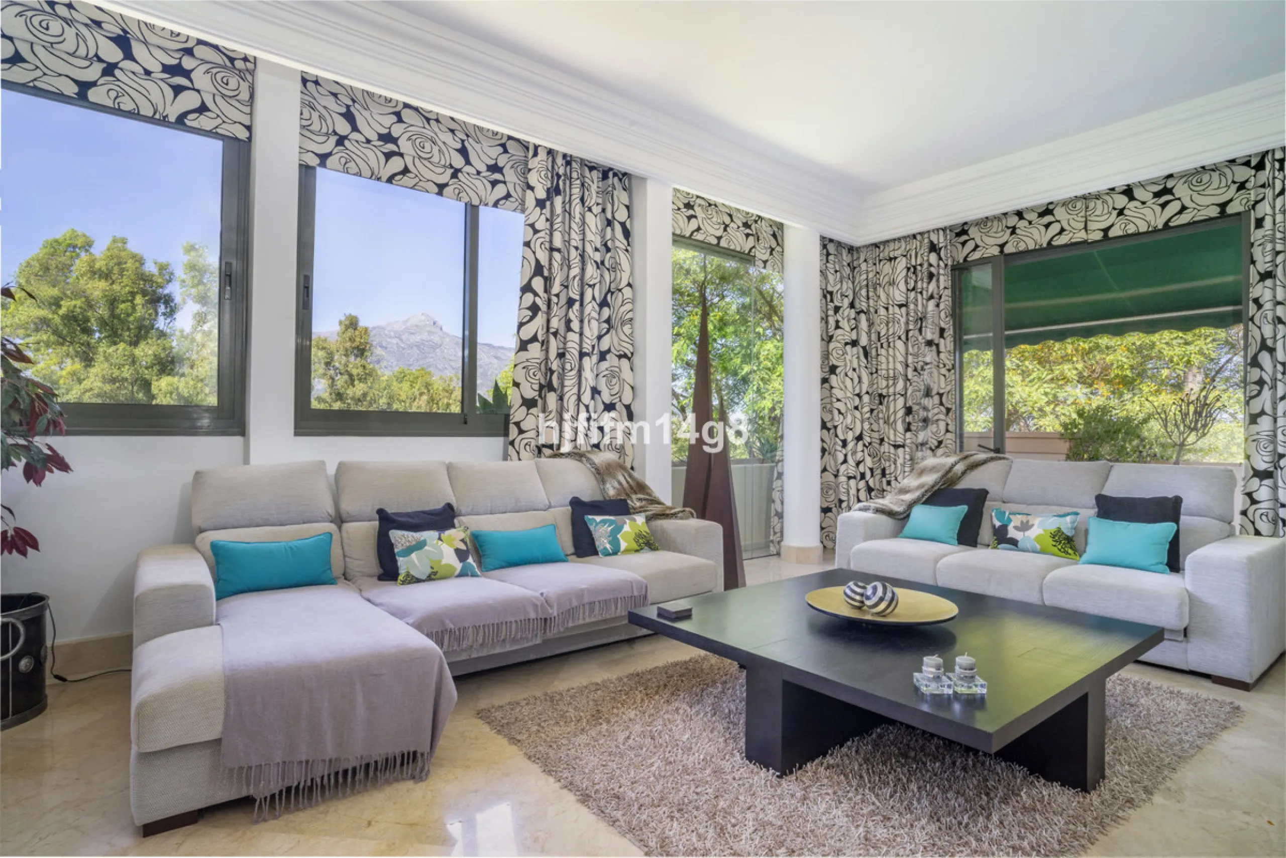 Welcome to this bright and spacious 2-bedroom penthouse in the sought-after Lorcrigolf community, perfectly positioned next to the golf course and offering spectacular views of La Concha Mountain.