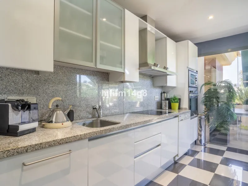 Welcome to this bright and spacious 2-bedroom penthouse in the sought-after Lorcrigolf community, perfectly positioned next to the golf course and offering spectacular views of La Concha Mountain.