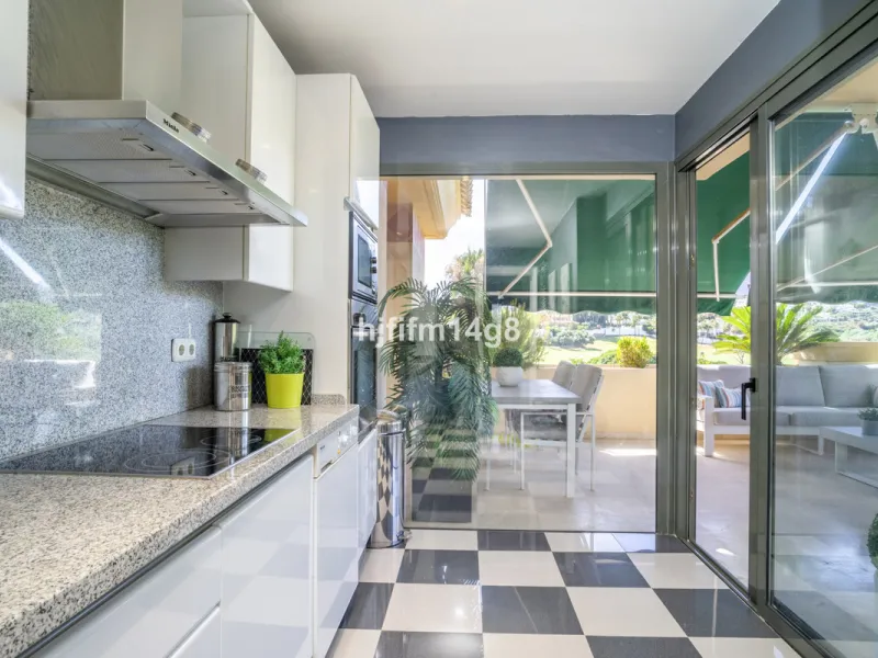 Welcome to this bright and spacious 2-bedroom penthouse in the sought-after Lorcrigolf community, perfectly positioned next to the golf course and offering spectacular views of La Concha Mountain.