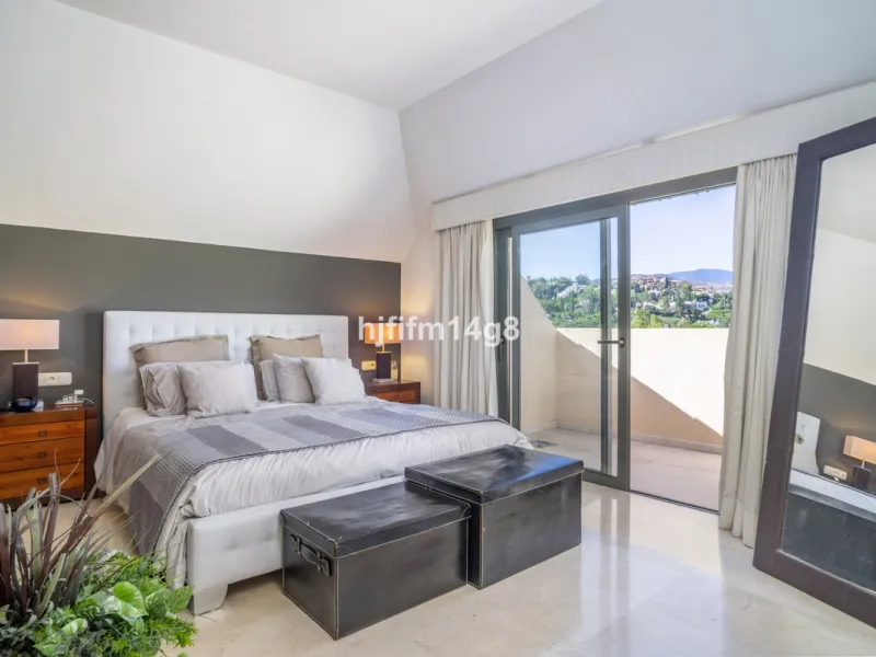 Welcome to this bright and spacious 2-bedroom penthouse in the sought-after Lorcrigolf community, perfectly positioned next to the golf course and offering spectacular views of La Concha Mountain.
