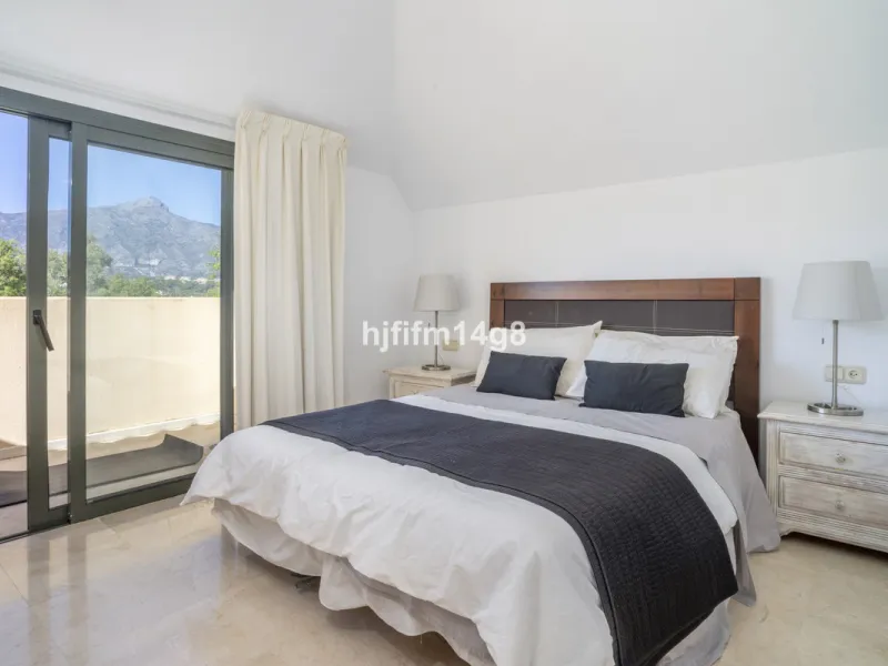 Welcome to this bright and spacious 2-bedroom penthouse in the sought-after Lorcrigolf community, perfectly positioned next to the golf course and offering spectacular views of La Concha Mountain.