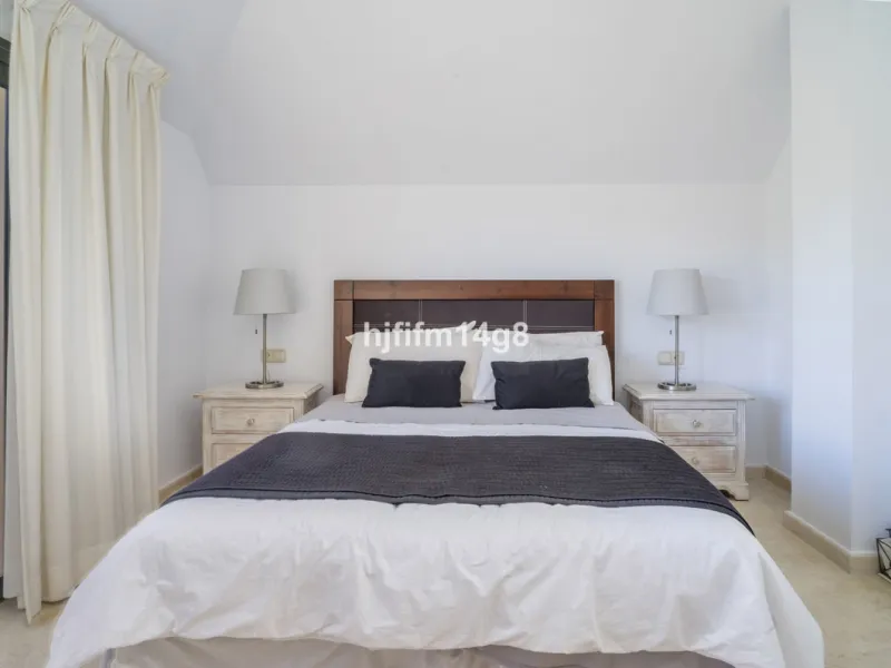 Welcome to this bright and spacious 2-bedroom penthouse in the sought-after Lorcrigolf community, perfectly positioned next to the golf course and offering spectacular views of La Concha Mountain.
